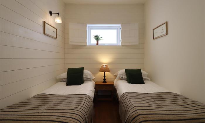 The Pavilion is predominantly a couple’s sanctuary, but has a small twin at the rear of the building, so can sleep four guests. The open plan layout i